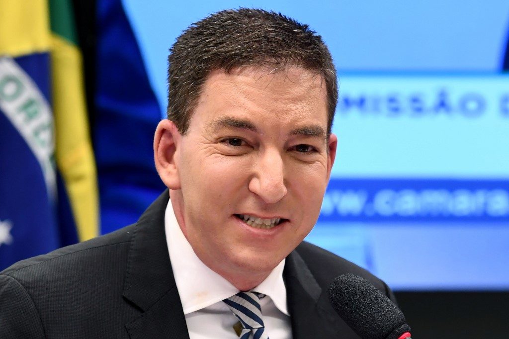 Brazil prosecutors charge U.S. journalist Greenwald with cybercrimes