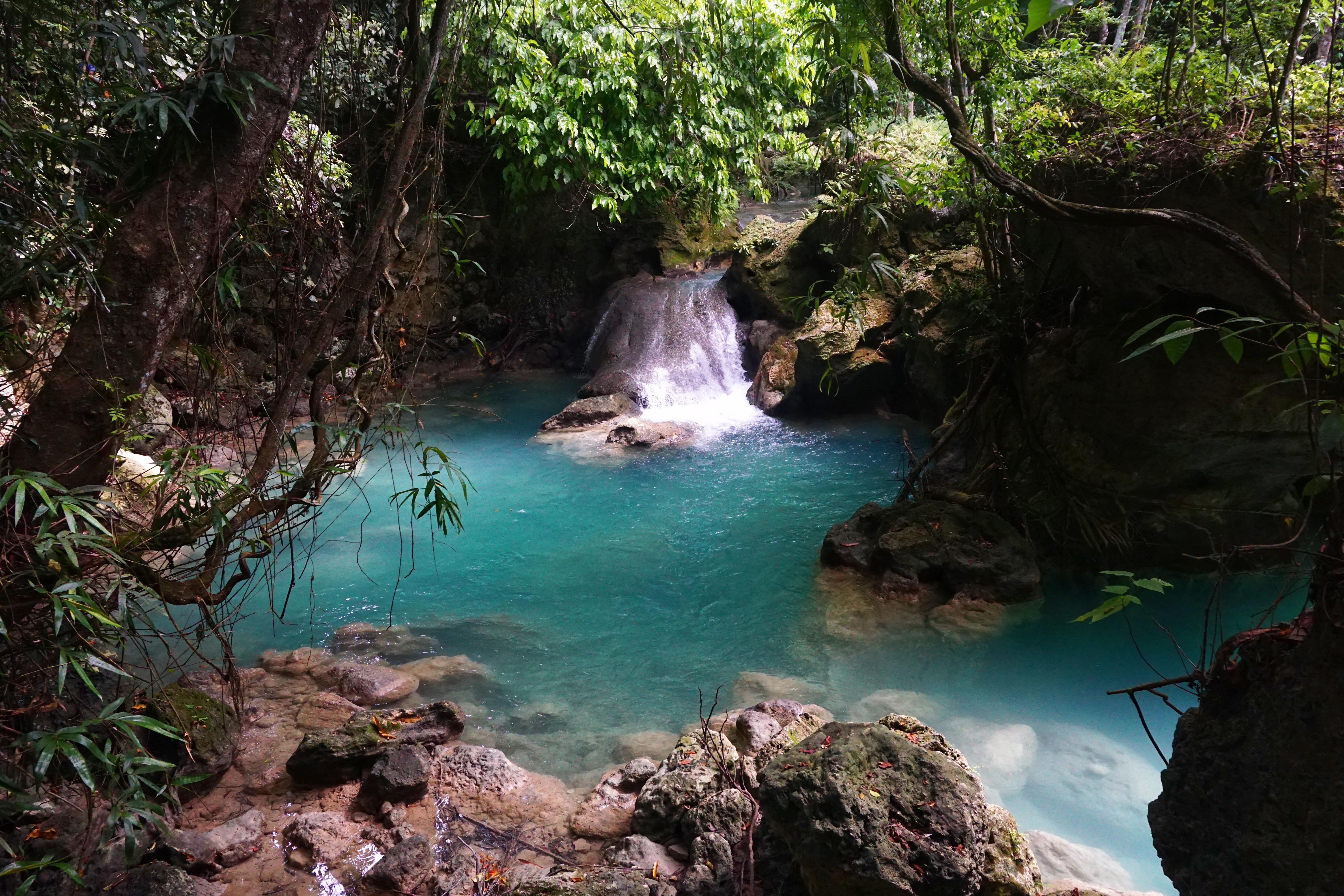 Even little streams like this one on the way to Kawasan are already picture-perfect. Photo by Louie Lapat/Rappler  