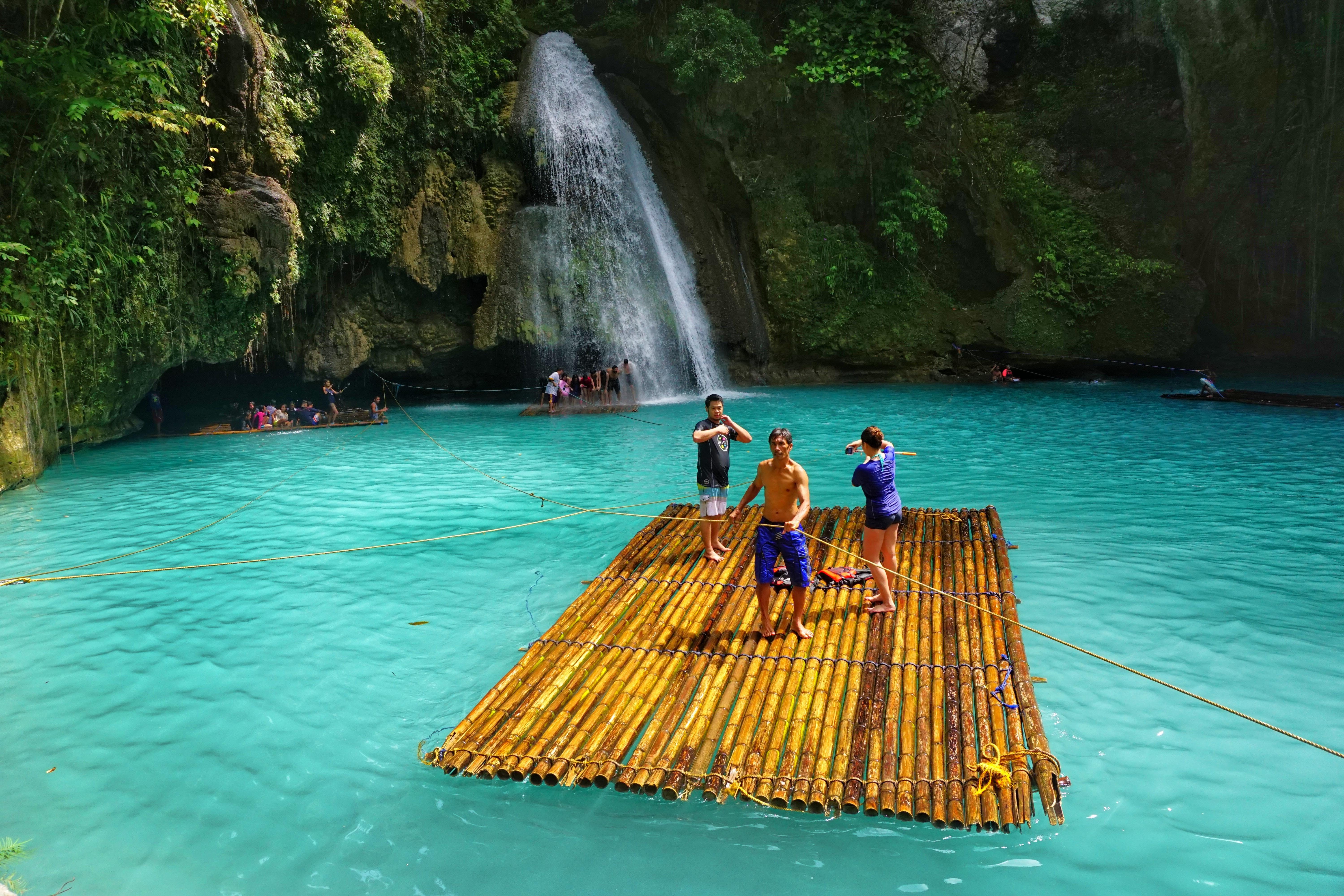UNBELIEVABLY BLUE. Perhaps the most-photographed spot in Kawasan, just standing in front of this basin, you'll feel the stress melting away. Photo by Louie Lapat/Rappler  