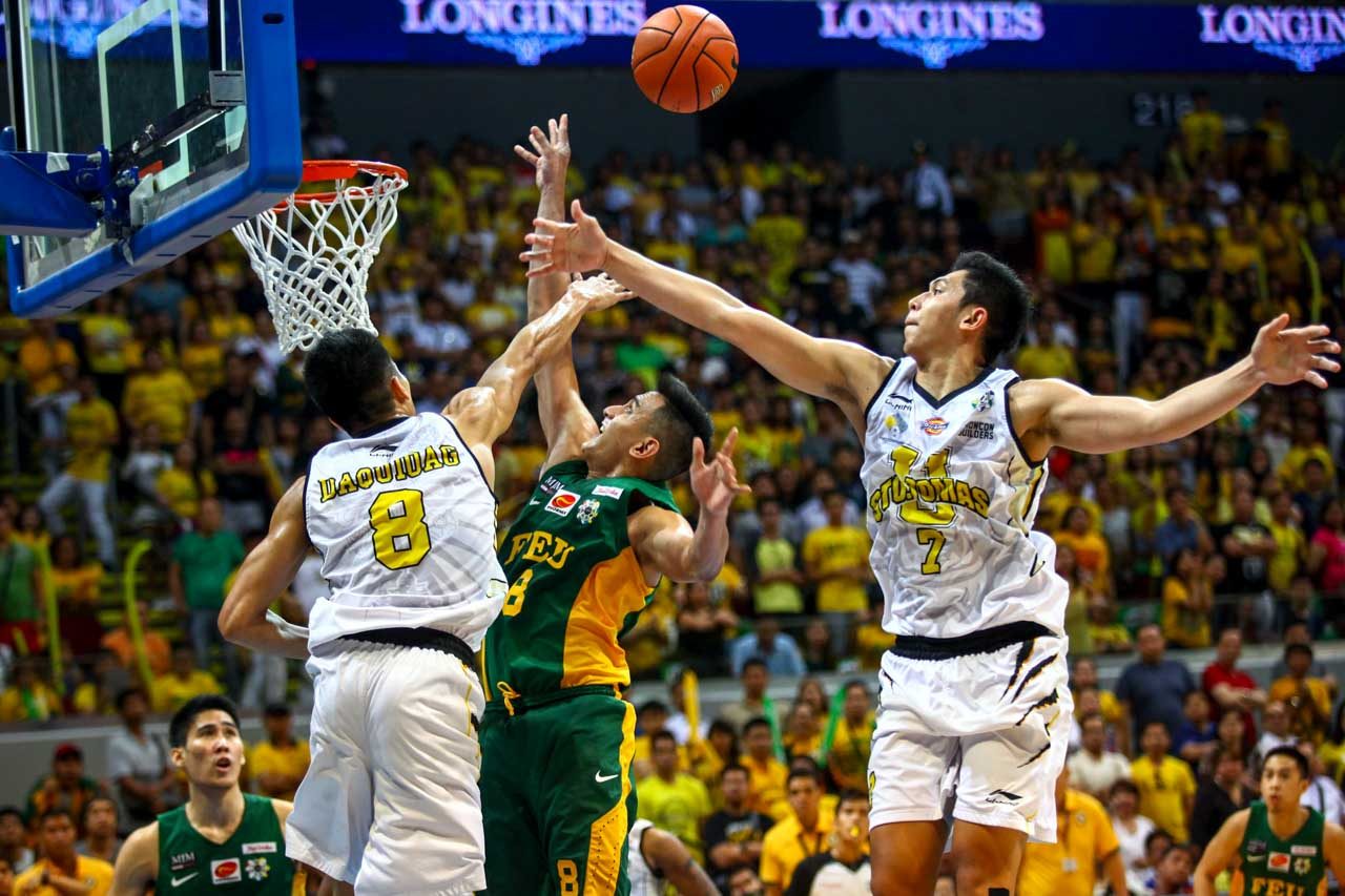 BATTLE. Kevin Ferrer (right) and Ed Daquioag (left) try to stop Russell Escoto (center). Photo by Josh Albelda/Rappler 
