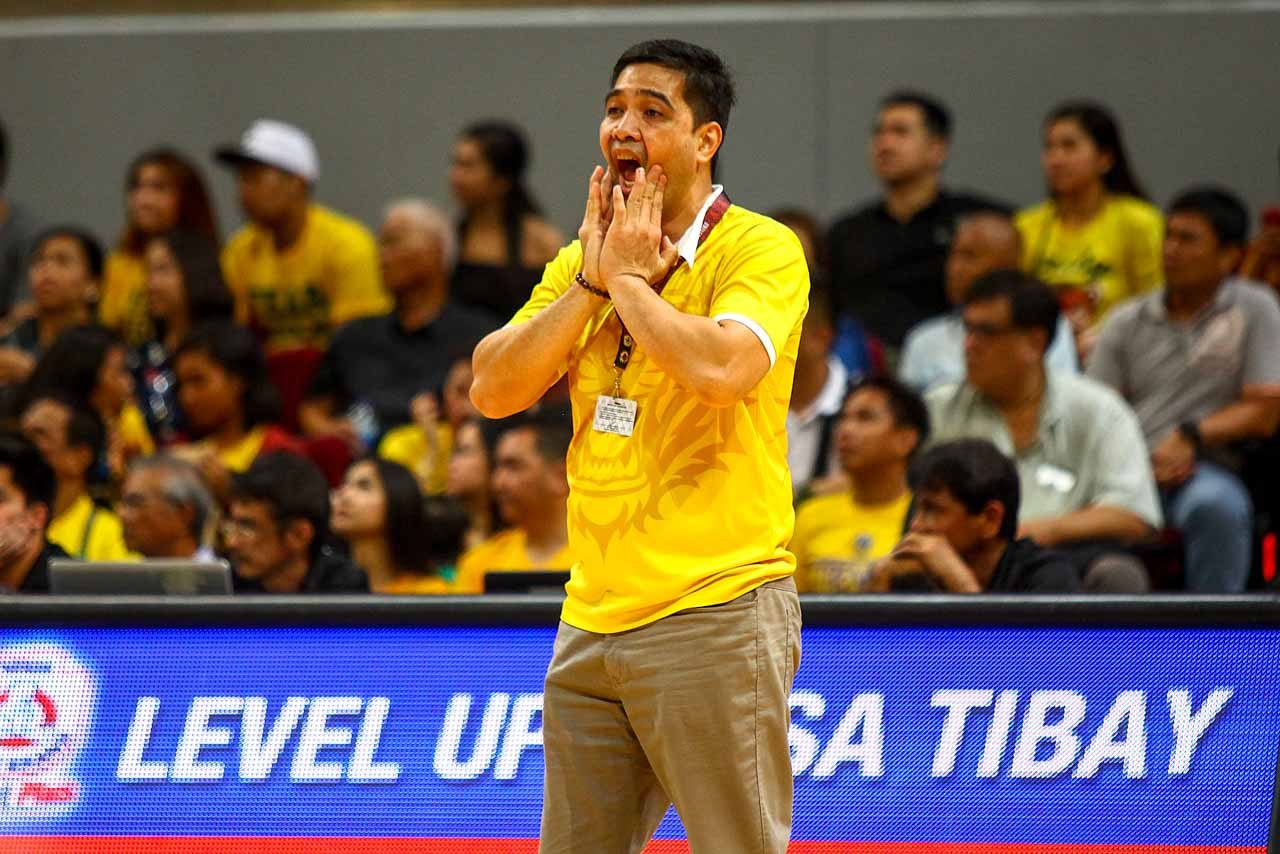 STUNNED. UST coach Bong Dela Cruz appears to not like what he's seeing on the court as FEU stuns UST. Photo by Josh Albelda/Rappler 