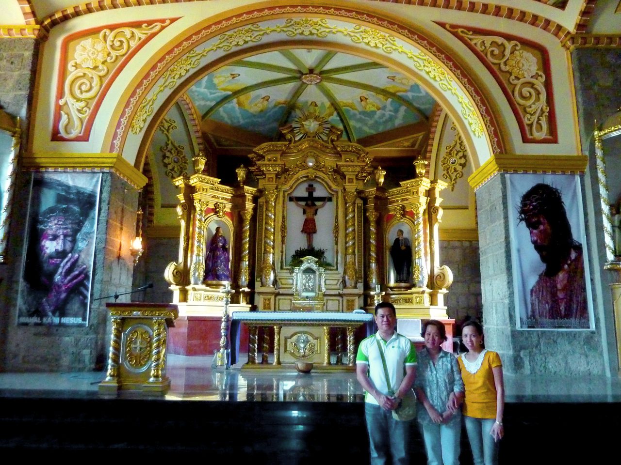 3-MAN TEAM. Green Faith Travels' facilitators (from left) Edwin Galvez, Larissa Bardos, and Judit Mangahis before the main altar of St. Mary Magdalene Parish Church in Pililla, one of the oldest churches in Rizal province. Photo from Green Faith Travelers 