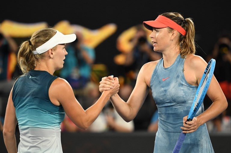 Sharapova says revenge not behind Wozniacki Open upset