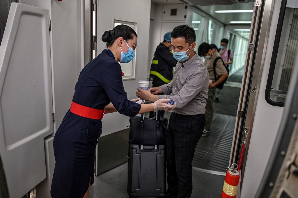 Face masks, health checks, and long check-ins: The future of flying
