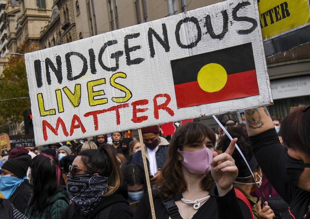 Defiant Australians protest racial injustice despite warnings