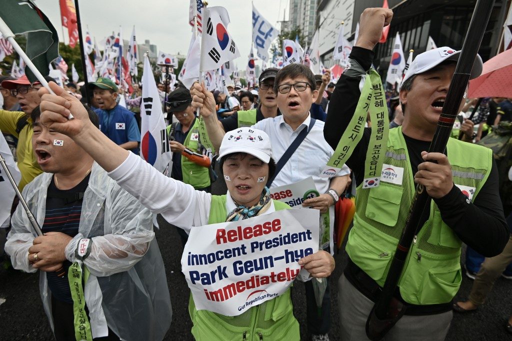 Retrials ordered for ex-South Korean leader Park, Samsung heir