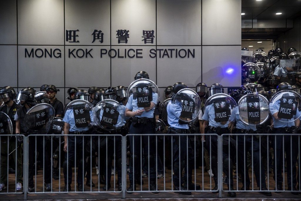 Hong Kong gov’t drops case vs OFW arrested near protest site