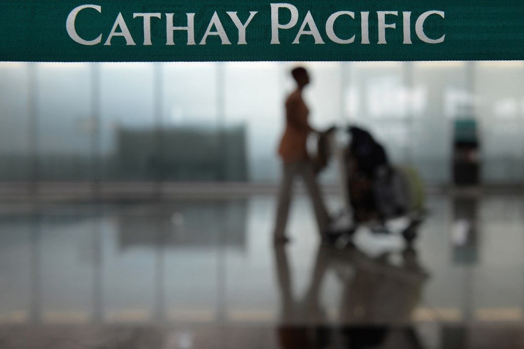 As China pressure mounts, Hong Kong’s Cathay sacks 2 pilots