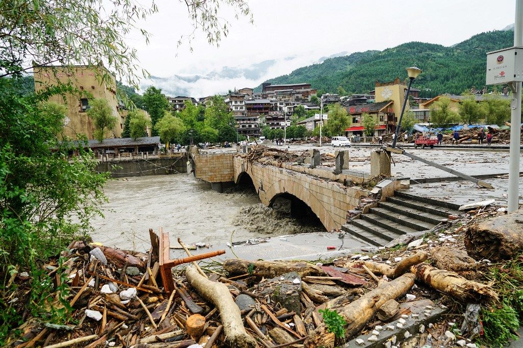Scores missing after southwest China hit by mudslides