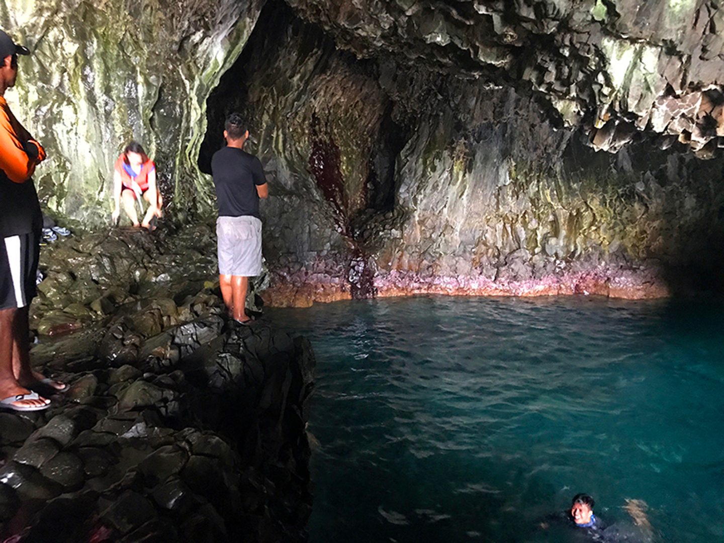 SWIMMING. Tourists dive in a lagoon inside Lussok cave. Photo by Raymon Dullana/Rappler   