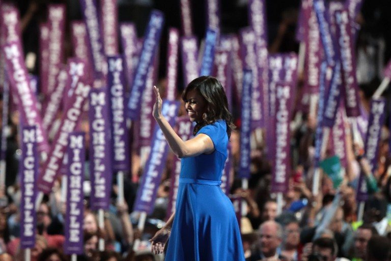 SHE'S FOR HILLARY. First lady Michelle Obama acknowledges the crowd after delivering remarks on the first day of the Democratic National Convention at the Wells Fargo Center, July 25, 2016 in Philadelphia, Pennsylvania. Drew Angerer/Getty Images/AFP 
