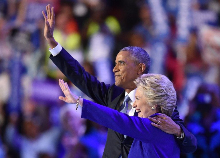 Obama passes torch to Clinton