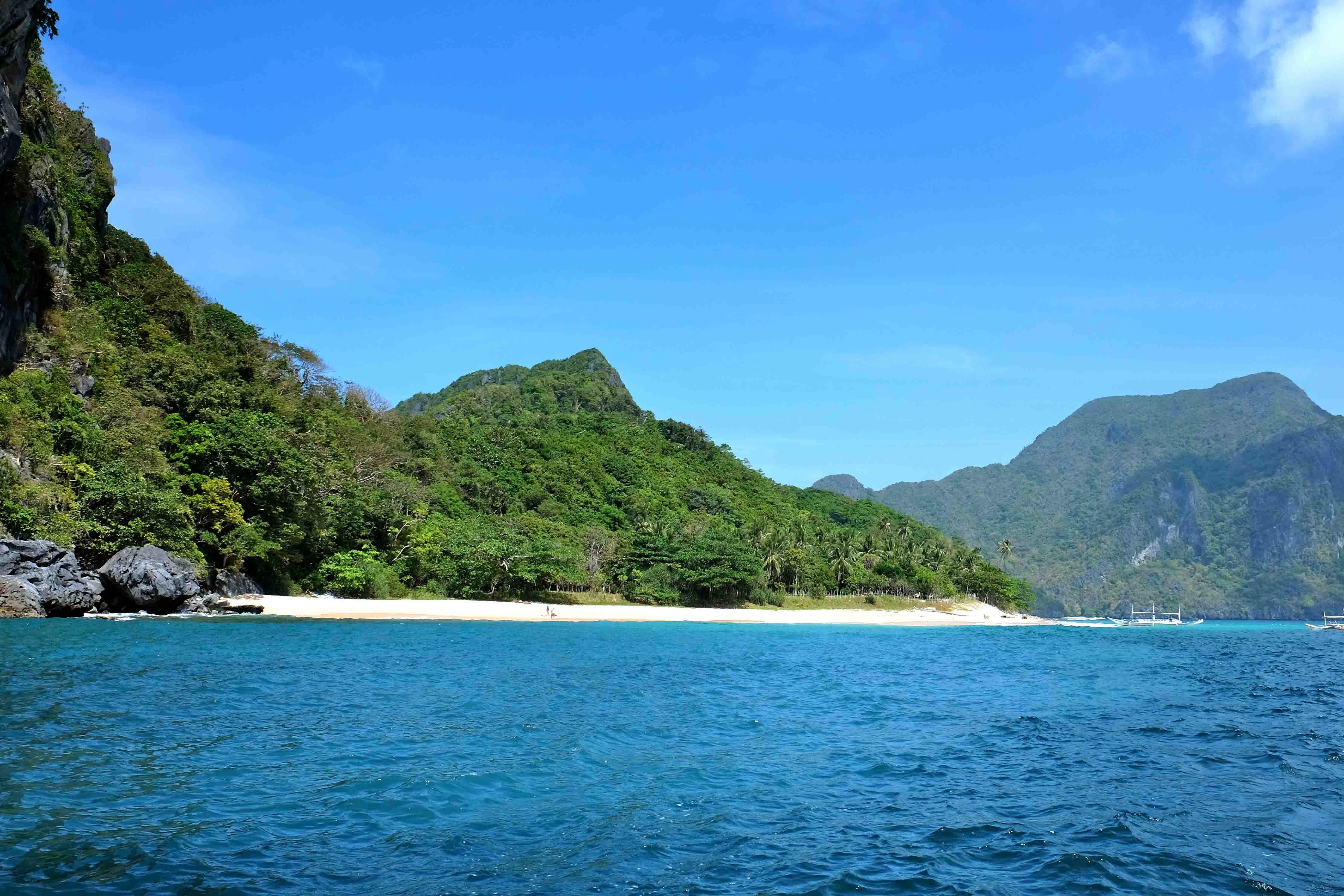 Island hopping edged with white sand beaches. Photo by Potpot Pinili/Rappler 