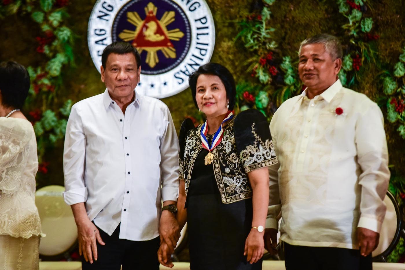President Rodrigo Duterte with team leader Dalisay Moya  
