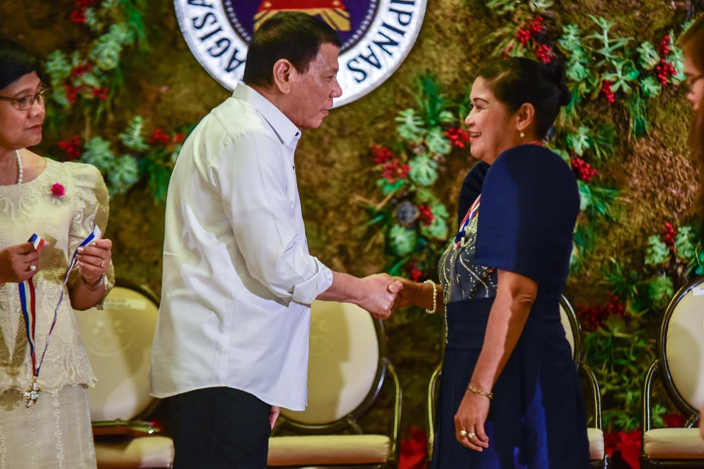 President Rodrigo Duterte with team leader Romana Basalan  
