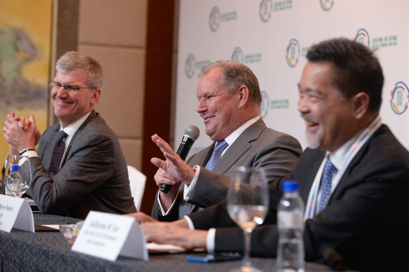 ON LIVABLE CITIES.  (From left) PwC's Robert Gittings, Melbourne's Lord Mayor Robert Doyle, and National Competitive Council's Guillermo Luz share what makes a city livable, citing various economic indicators. Photo by Alecs Ongcal/Rappler   