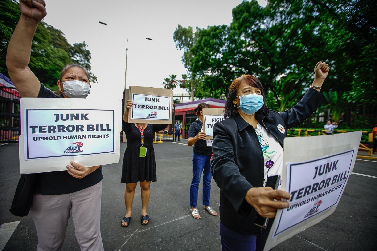 CONDEMNATION. ACT Teachers Representative France Castro (1st from R) join various sectors in staging a protest caravan and noise barrage outside the gates of the House on June 3, 2020, demanding the scrapping of the anti-terrorism bill. Photo by Jire Carreon/Rappler  