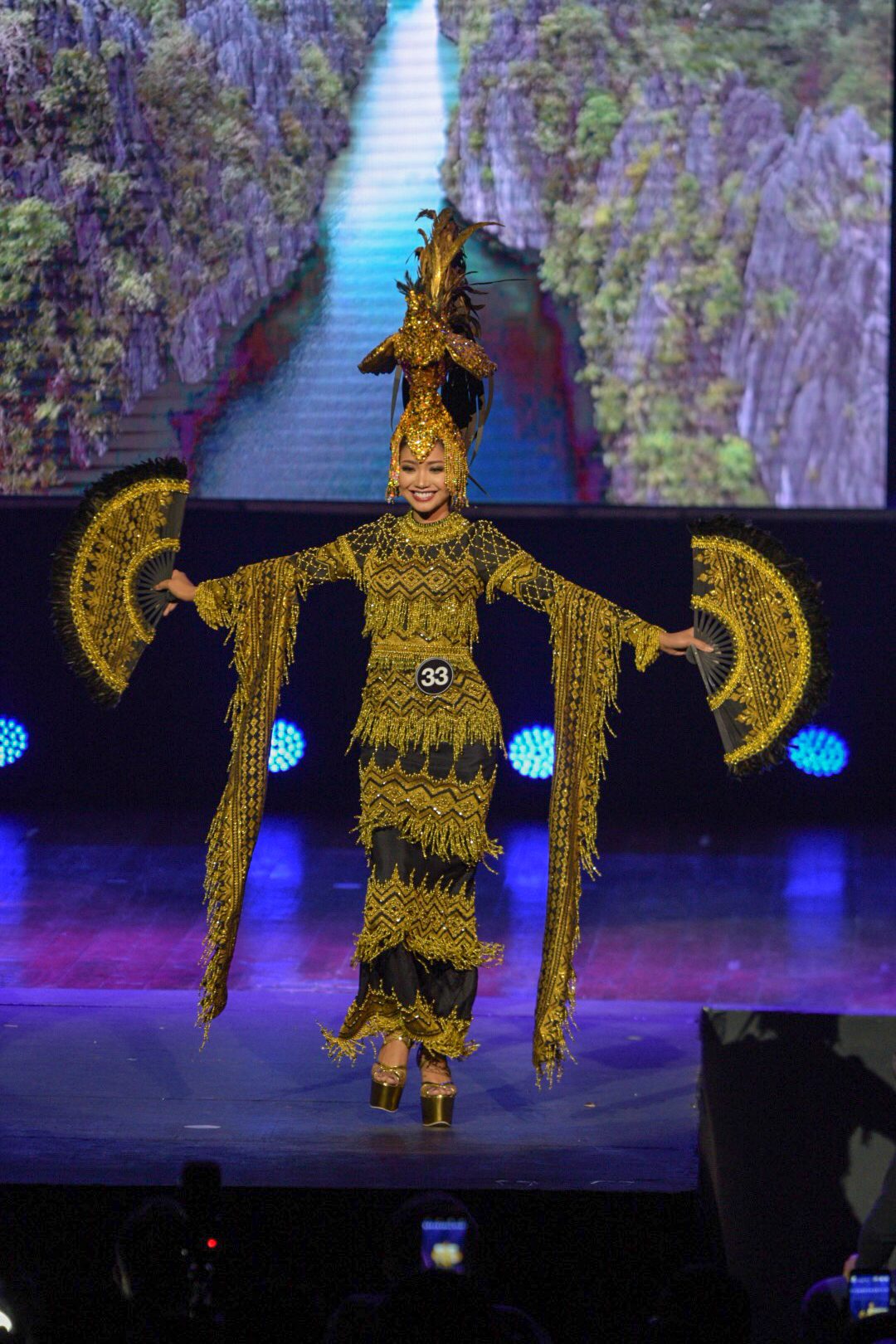 BLACK AND GOLD. Stephanie Abellanida shows her sarimanok-inspired costume during the fashion show. 