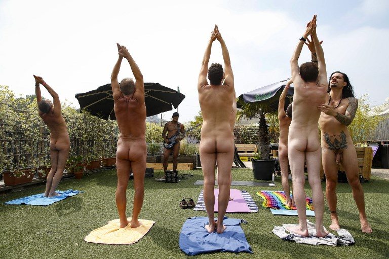 YOGA IN THE NUDE. People take the nudist yoga lessons at the Point Ephemere on June 10, 2018 in Paris. Photo by Geoffroy Van Der Hasselt/AFP  