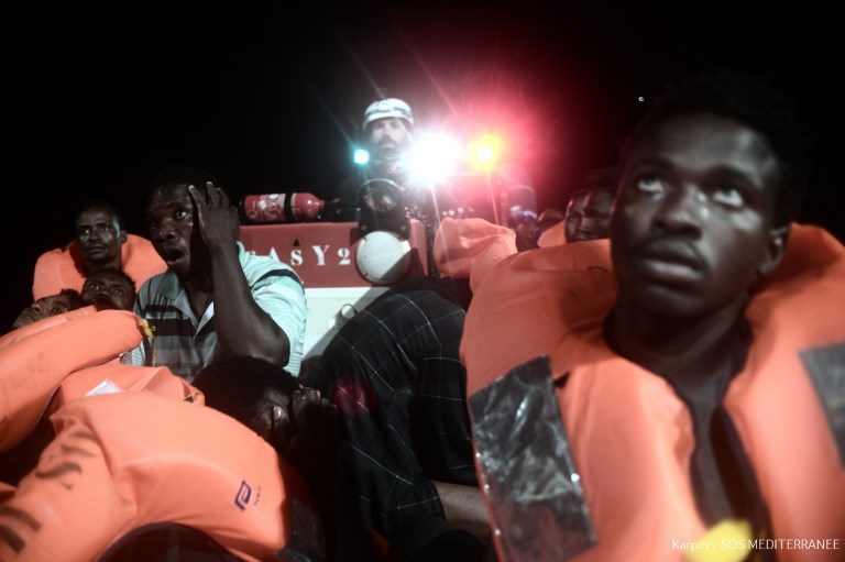 SEA RESCUE. Migrants from Malta rescued in the Mediterranean sea boards the French NGO's ship Aquarius on June 9, 2018. Photo by Karpov/SOS Mediterranee/AFP  