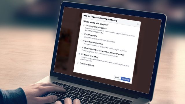 Facebook lets you report a ‘false news story’ – if you can find that option