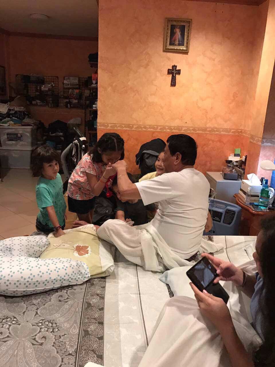 'MANO PO.' President Rodrigo Duterte spends time with his grandkids. 