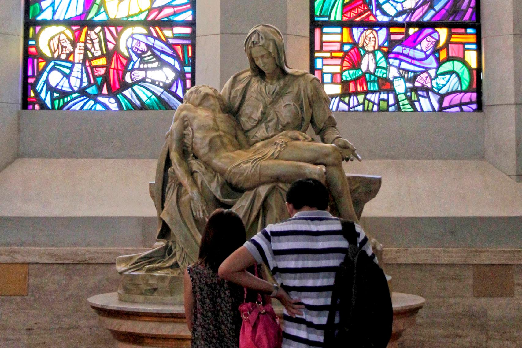A replica of Michaelangeloâs âPietaâ is displayed at Manila Cathedral, located inside the district of Intramuros in Manila. Photo by Louie Lapat 