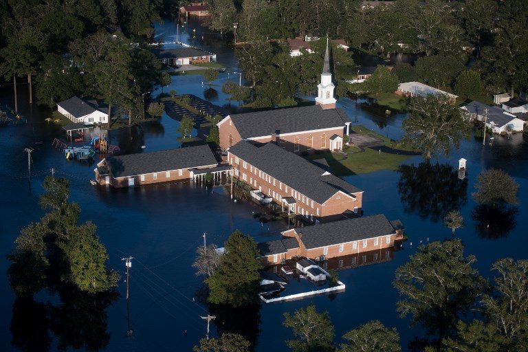 INUNDATED. A church is surrounded by floodwaters from Hurricane Florence on September 17, 2018, in Conway, South Carolina. Photo by Sean Rayford/Getty Images/AFP   