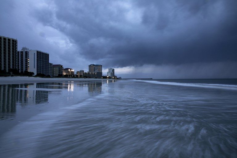 U.S. coast battered by wind, rain as Hurricane Florence closes in