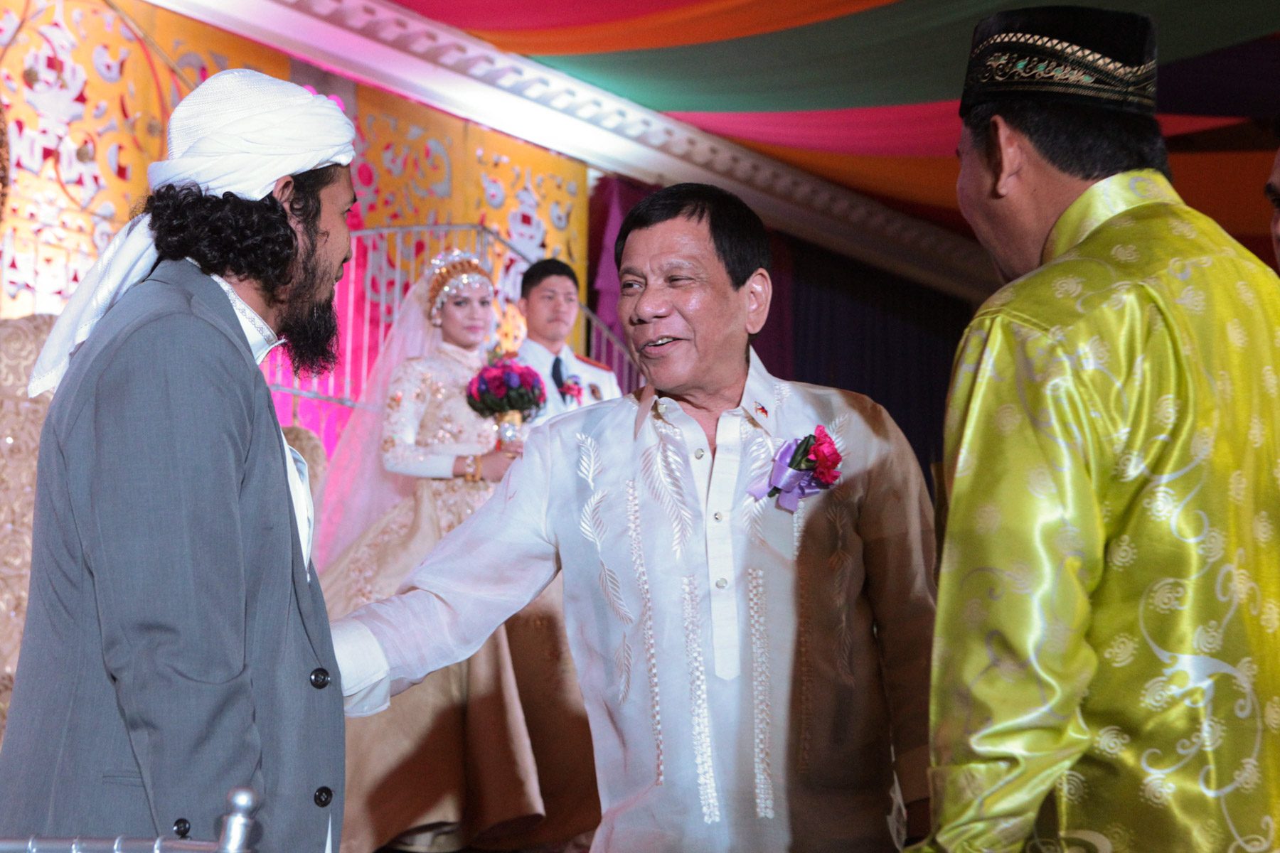 MUSLIM WEDDING. President Rodrigo Duterte greets the Imams who presided over the wedding. Photo by Albert Alcain/Presidential Photo 
