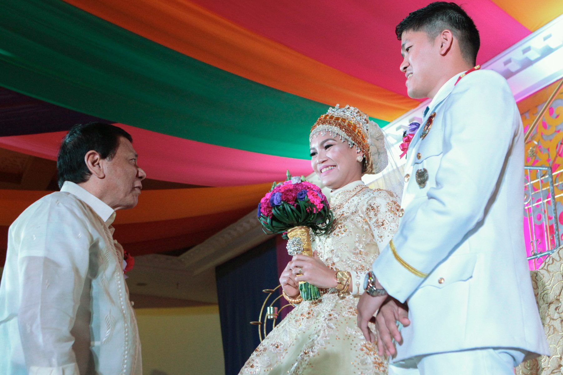 Duterte goes to wedding of cop who proposed in front of him