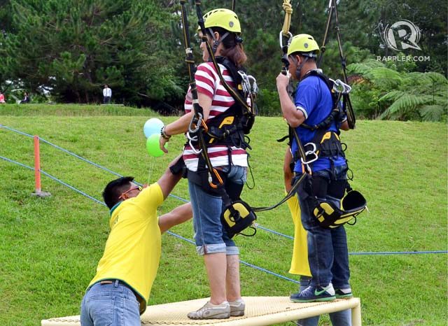 INSPECTION. Before being hoisted above the ground, the body harness is again inspected 