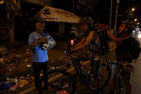 CHRISTMAS EVE. Volunteer bikers from Bike Scouts Philippines spend their Christmas on the road for the fourth time.  