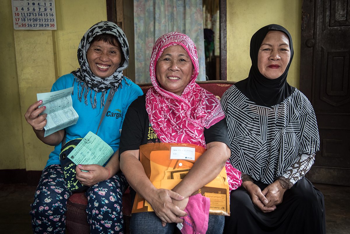 BACK HOME. Arcelie Baldoviso, Arlene Orcilino, and Norjana Taurak sought shelter in various evacuation camps in Iligan City while the fighting in Marawi City was ongoing. They have returned home in November 2017. They are grandmothers and breadwinners of their families. Photo by Alecs Ongcal/UNHCR  