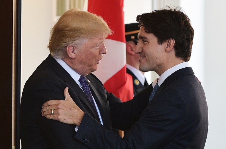 Trump, Trudeau grapple with differences on refugees, trade
