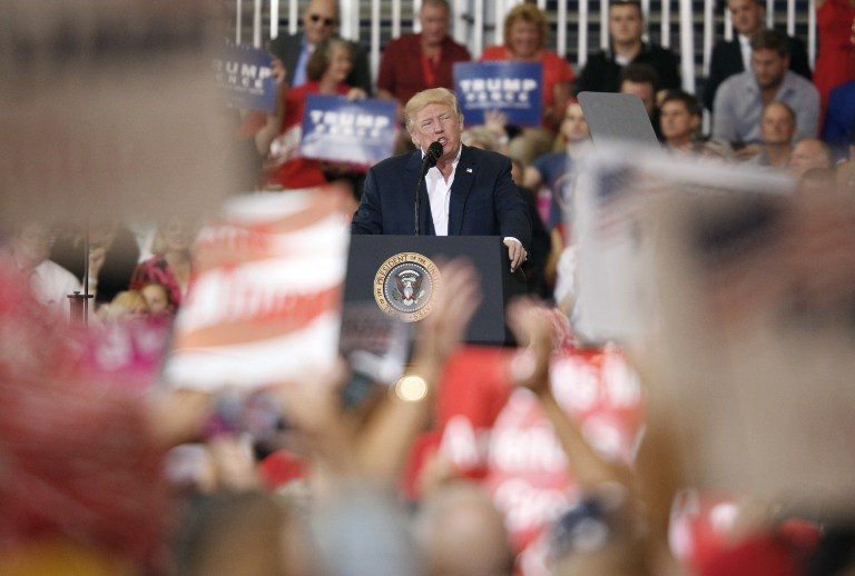Trump reassures base in fiery campaign-style speech