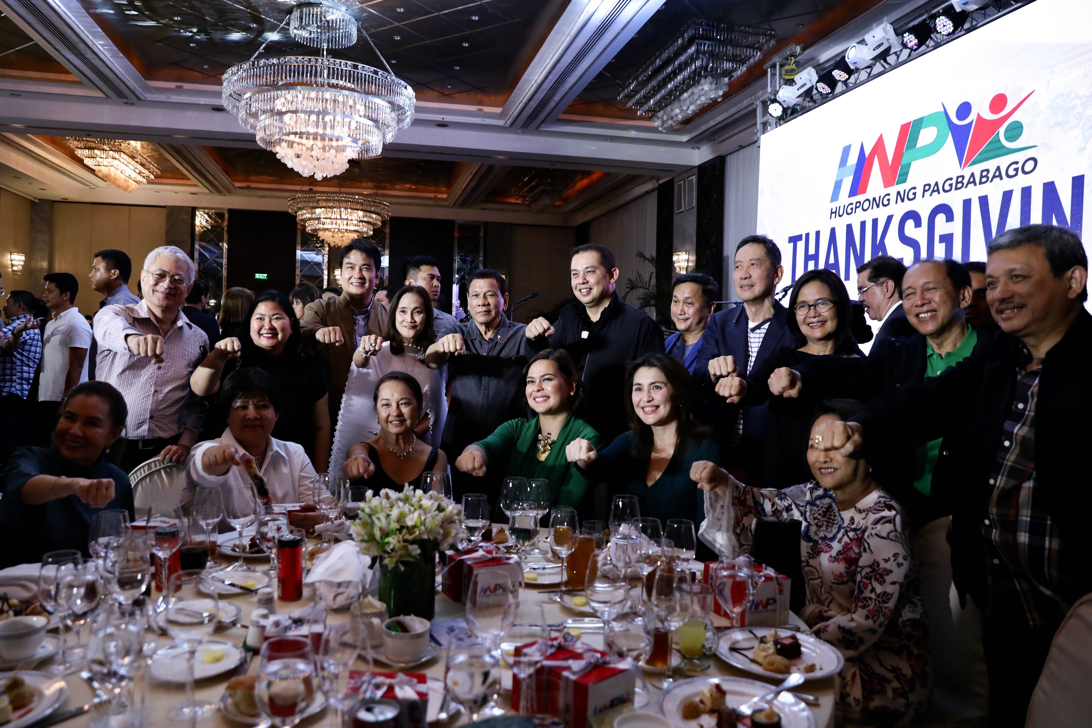 ALLIES. President Duterte and HNP chairperson Sara Duterte strikes a fist bump pose with HNP allies and members. Malacañang photo 