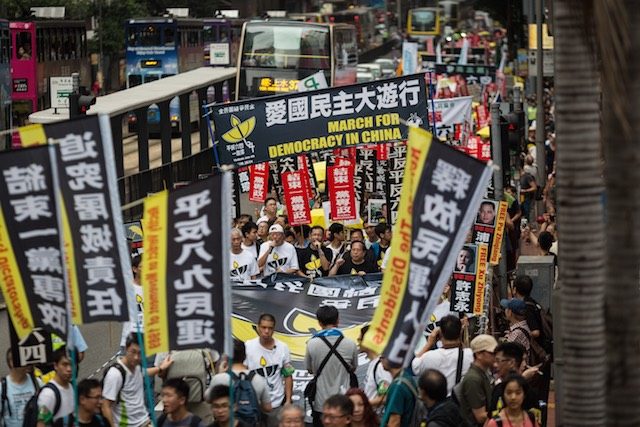 Massive Tiananmen vigil expected in divided Hong Kong