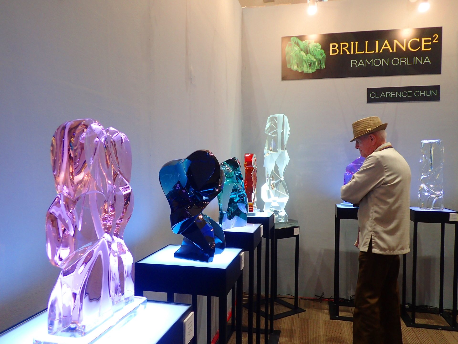 GLASS. Ramon Orlina, a well-known glass sculptor who is known for pioneering sculpting glass in its solid state, portrays different concepts like intimacy (shown by pink sculpture on the foreground) through his art. 