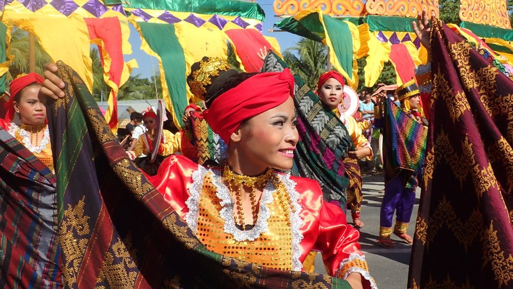 INAUL FESTIVAL. Street dancing with inaul fabrics is a staple at the Inaul Festival, which was created to keep the inaul tradition alive in Maguindanao. 