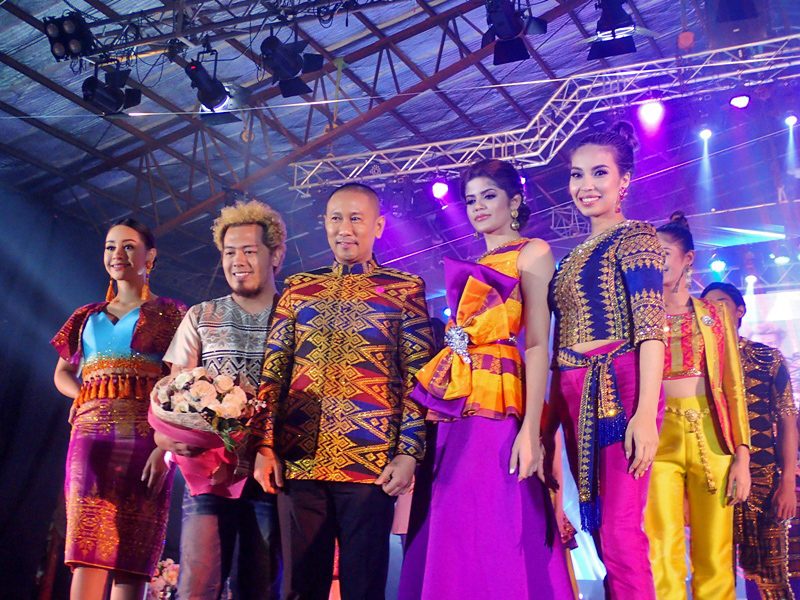  INAUL DESIGNER. Designer Akmad Kari (second from the left), with Maguindanao Governor Esmael Mangudadatu to his left, and beauty queens wearing his designs at the Governor’s Ball and fashion show at this year’s Inaul Festival. 