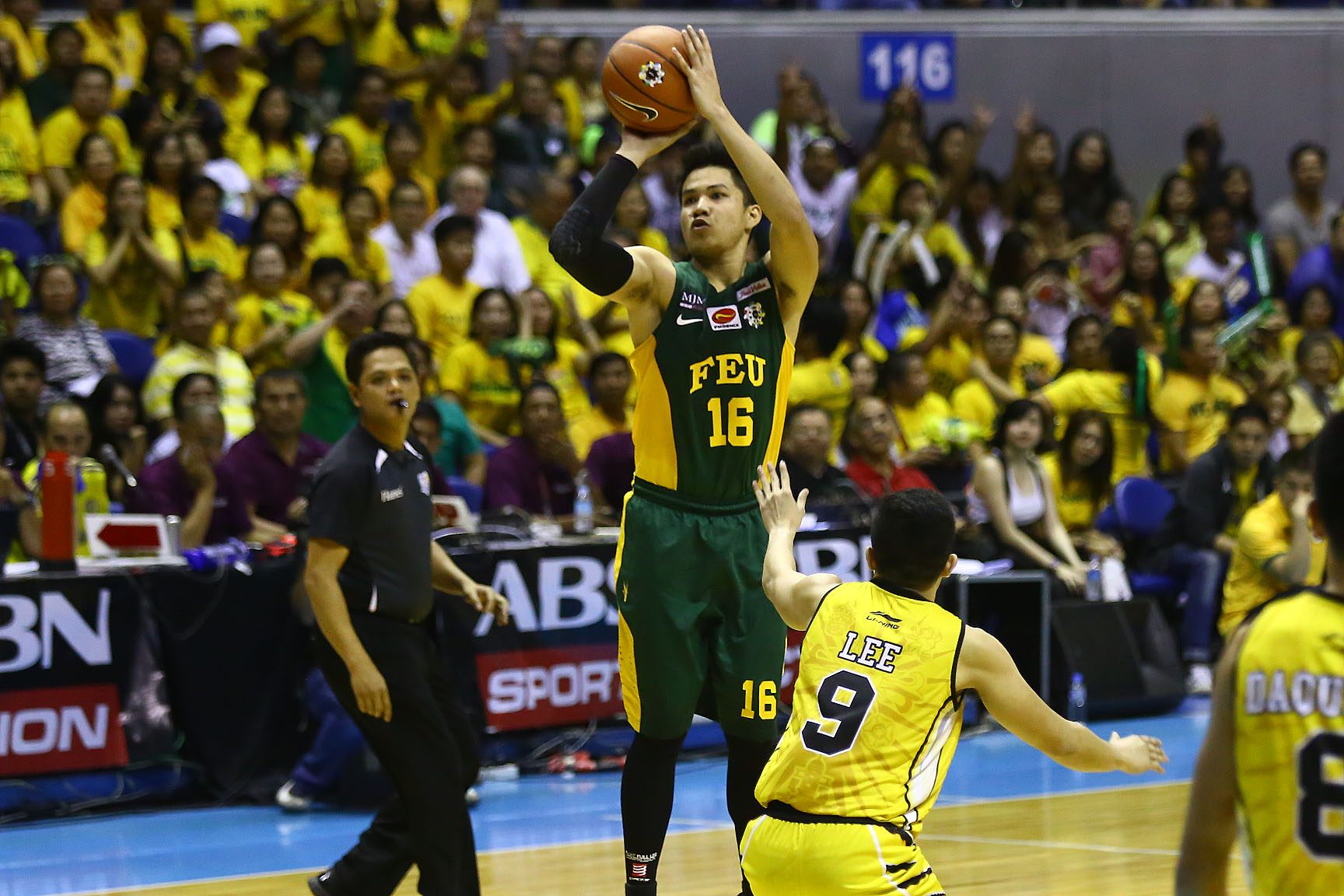 CRAMPS. FEU gunner Roger Pogoy cramped up towards the end of the game but still had 12 points and 6 rebonds. Photo by Josh Albelda / Rappler 