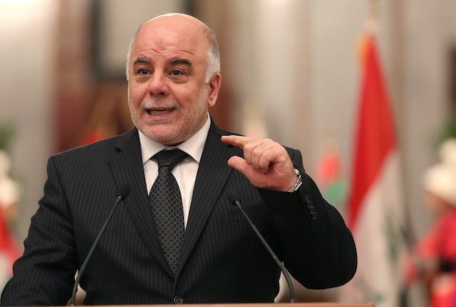 Iraqi Prime Minister, Haider al-Abadi, gestures during a press conference in Baghdad, Iraq, 18 December 2014. Hadi Mizban/AP/Pool/EPA 