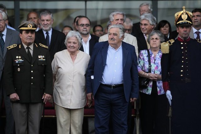 FIRST COUPLE. Uruguay President Jose Mujica (C) and his wife Senator Lucia Topolansky (3-L) attend a ceremony at Independence square in Montevideo, Uruguay, 27 February 2015. Hugo Ortuno/EPA 