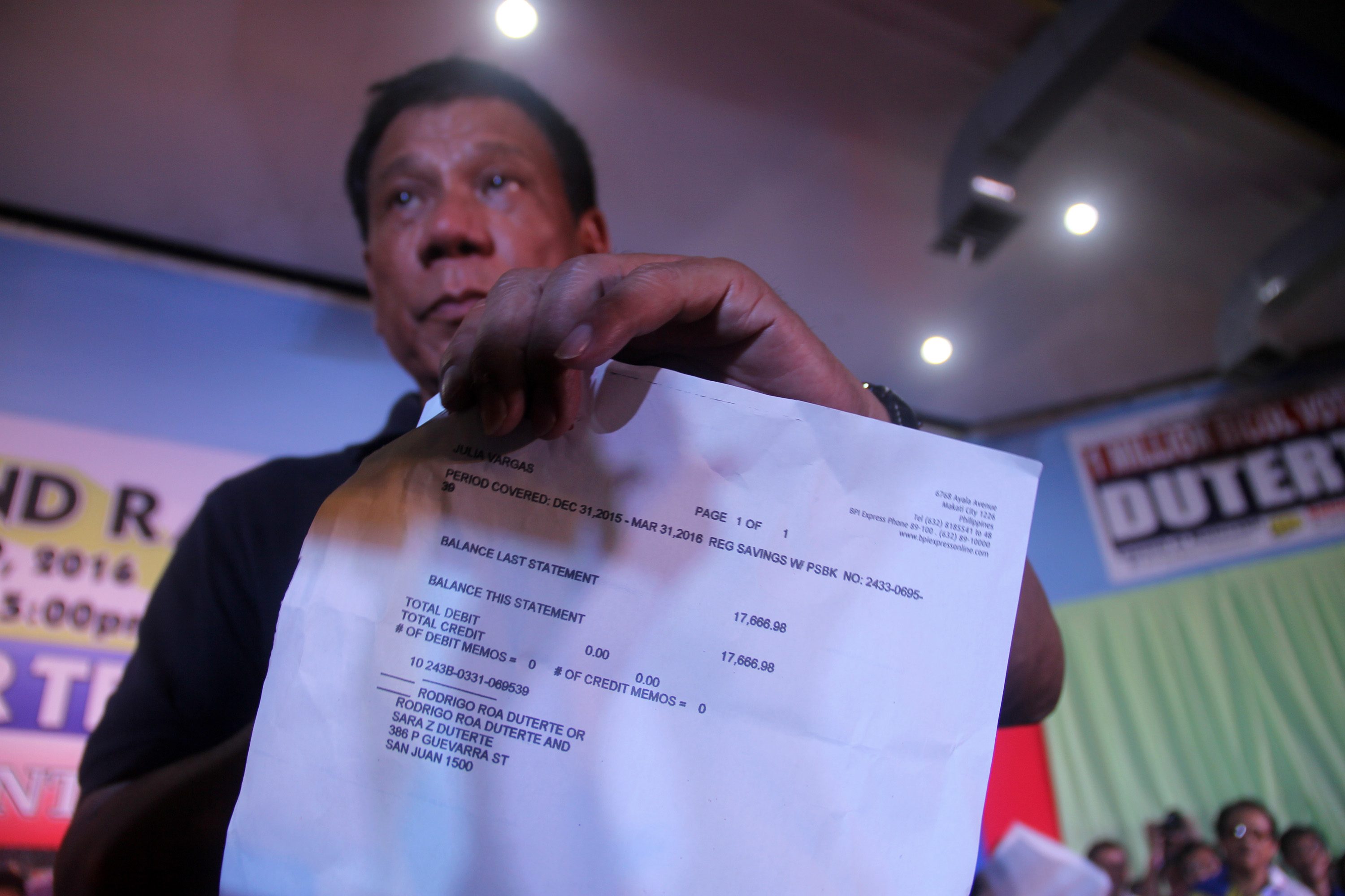 CERTIFIED COPY. Mayor Rodrigo Duterte shows the media a bank statement from the Bank of the Philippine Islands. Photo by Rhaydz Barcia/Rappler
 