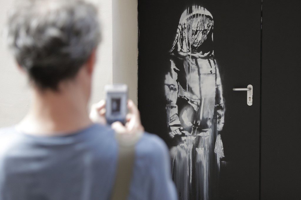 Stolen Banksy work recovered in Italy