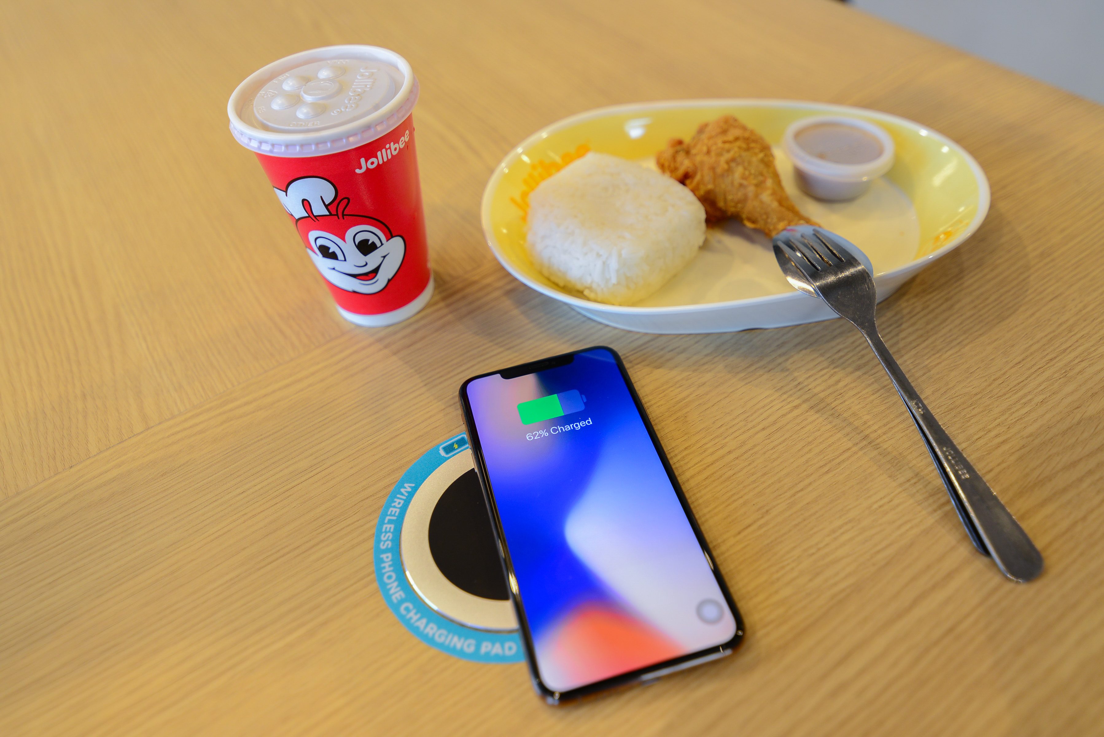WIRELESS CHARGING. Enjoy your favorite Jollibee meals while using the wireless charging station.  