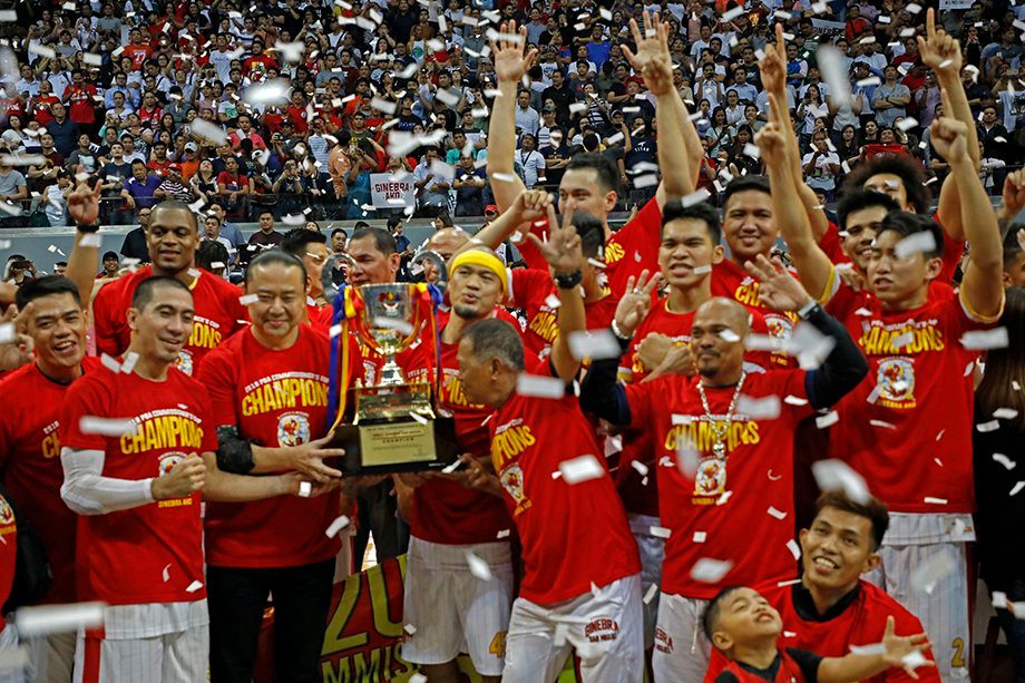 CELEBRATION. Barangay Ginebra Gin Kings players and supporters celebrate on the floor after winning the PBA Commissioners Cup title against the San Miguel Beermen at the MOA Arena on August 8, 2018. PBA Images  