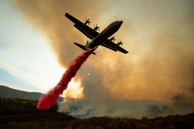 FIRE FIGHTER. An air tanker drops retardant on the Ranch Fire, part of the Mendocino Complex Fire, burning along High Valley Rd near Clearlake Oaks, California on August 5, 2018. Photo by Noah Berger/AFP  