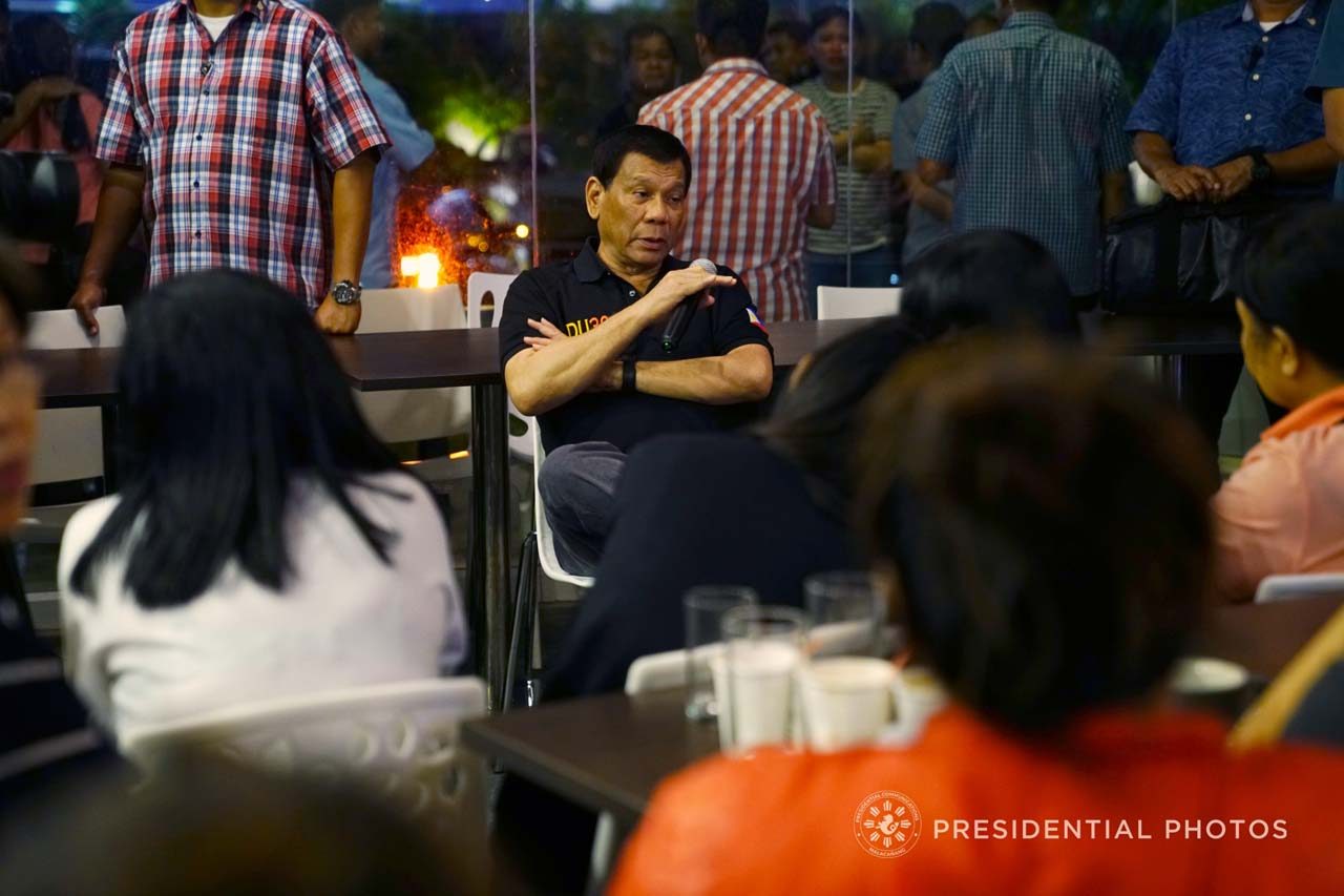Duterte visits relatives of Davao mall fire victims